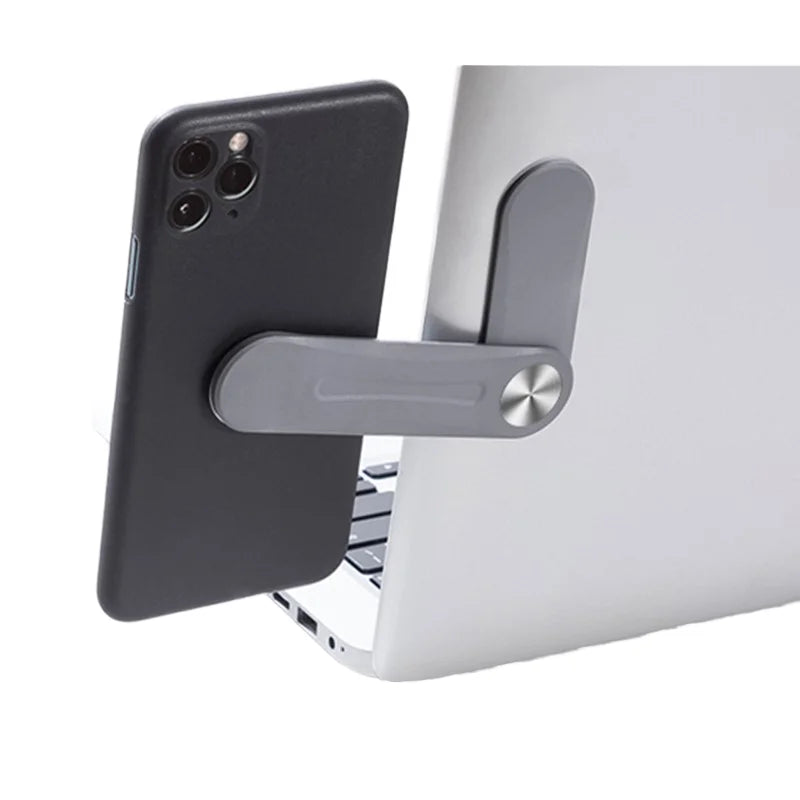 Orbihold magnetic laptop side phone holder in use