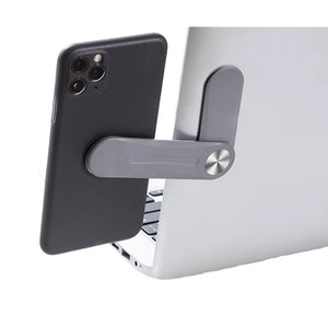 Orbihold magnetic laptop side phone holder in use